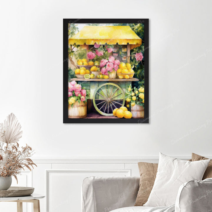 Sunny Lemonade Stand Finished Diamond Painting Displayed with Black Frame as Home Decor