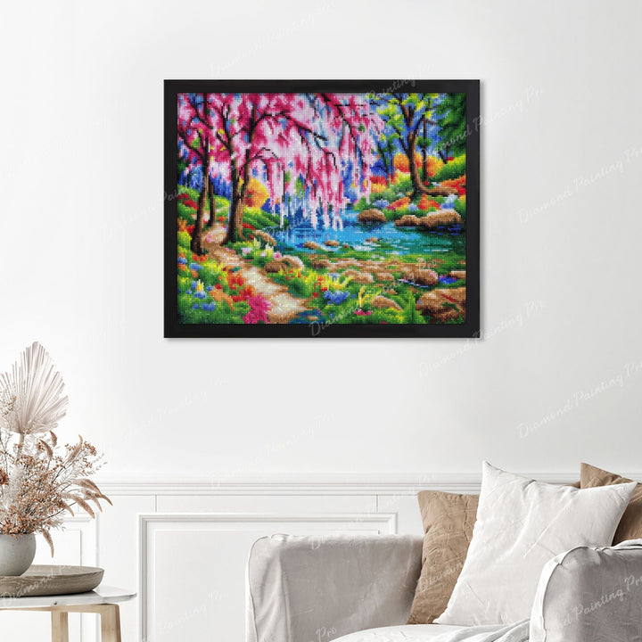 Cherry Blossom Tree Near River Finished Diamond Painting Displayed with Black Frame as Home Decor